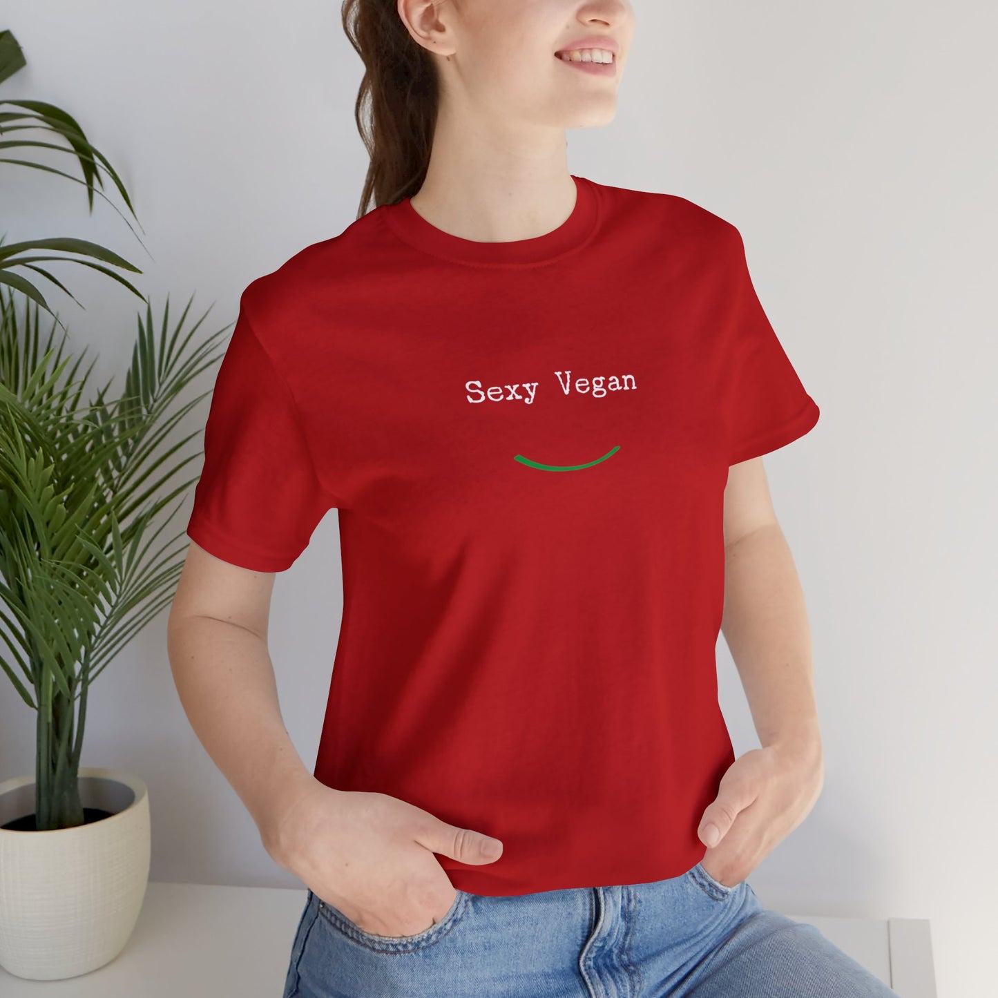 front "Sexy Vegan" red t-shirt with smile female lifestyle