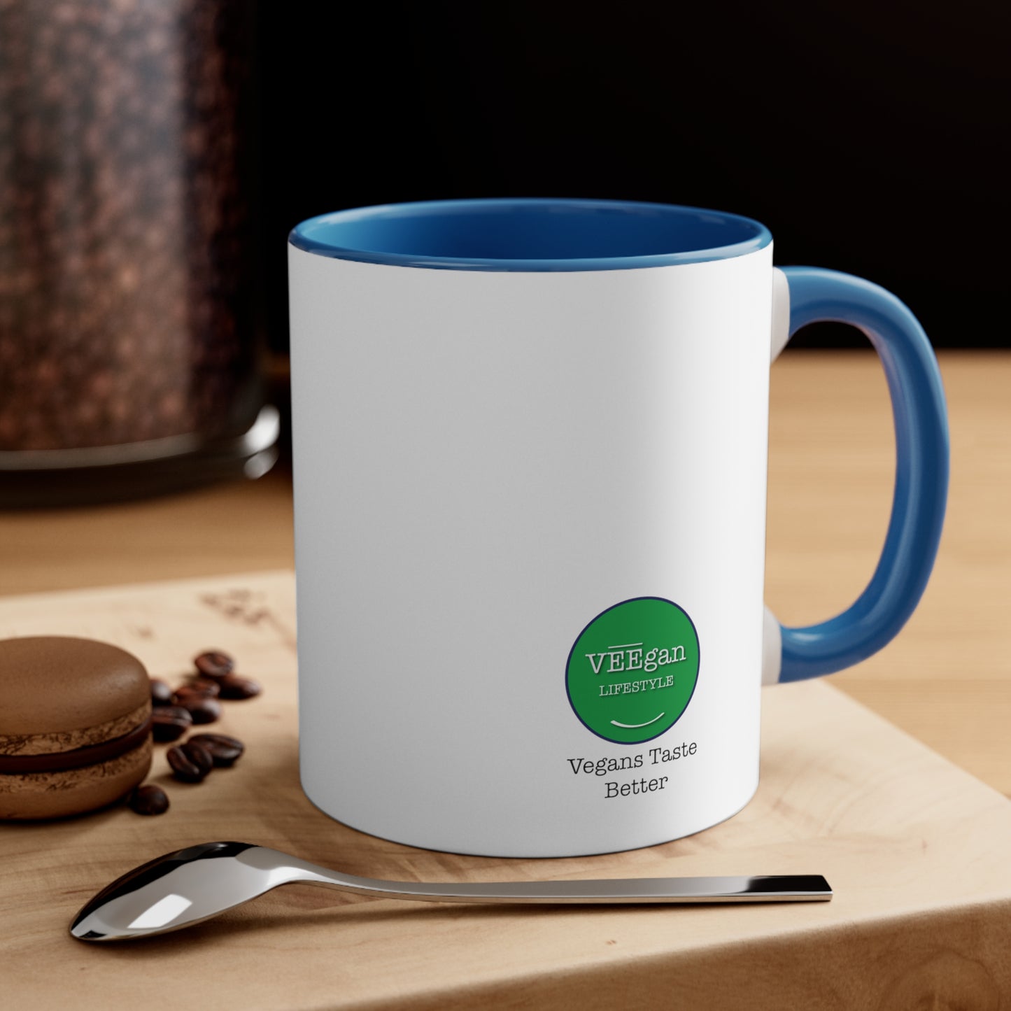 back view "Vegans Taste Better" blue accent mug in lifestyle setting