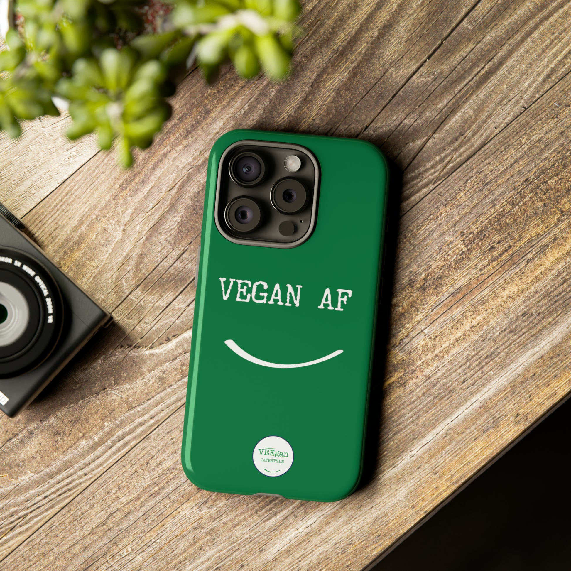 front view "Vegan AF" Tough green Phone Case with smile  lifestyle environment