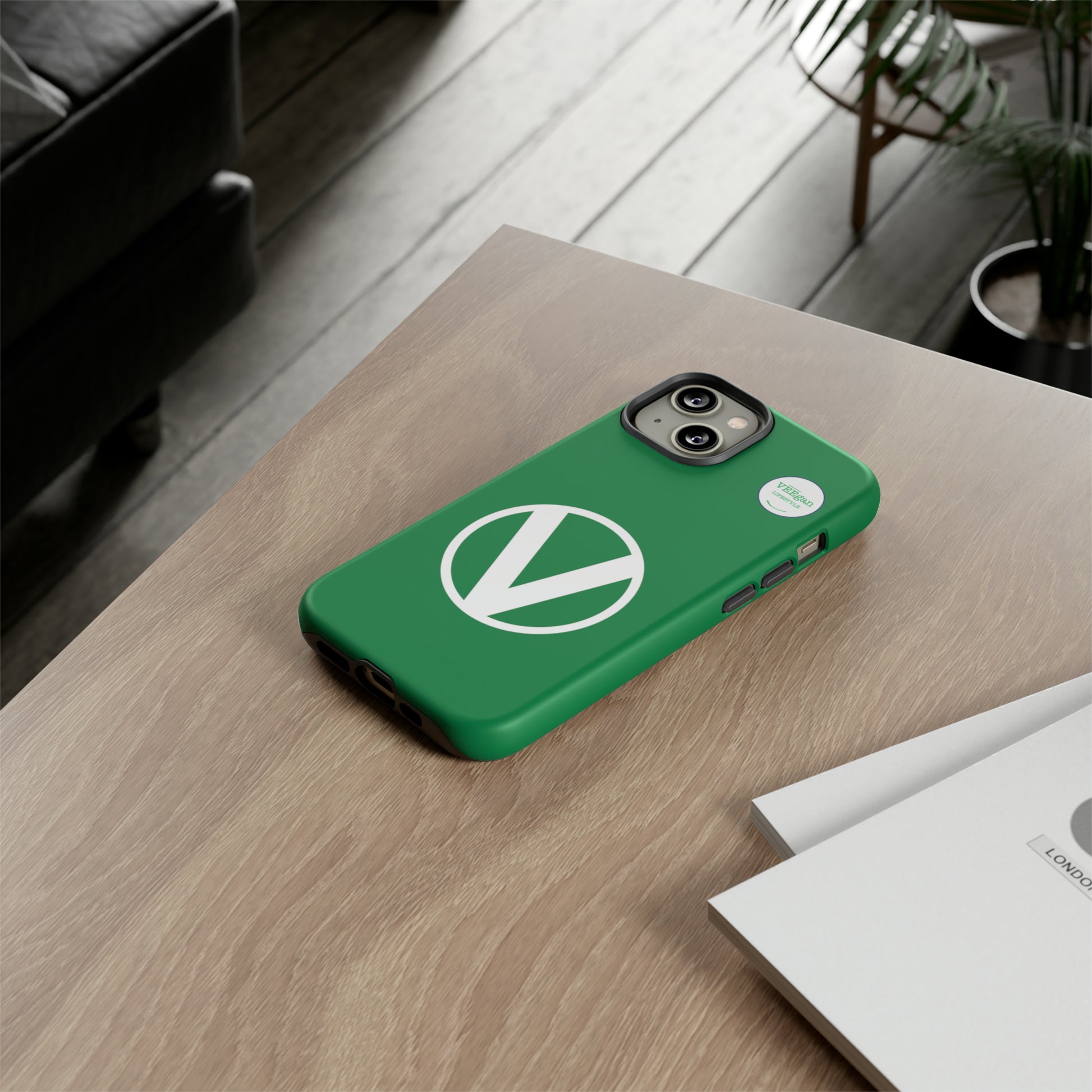 front view "Circle-V" green tough phone case on office desk