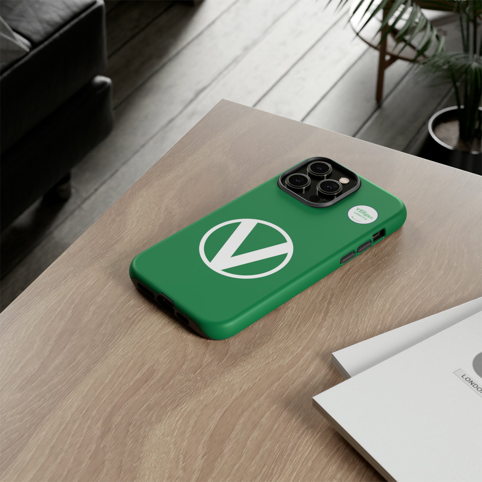 front view "Circle-V" green tough phone case on office desk