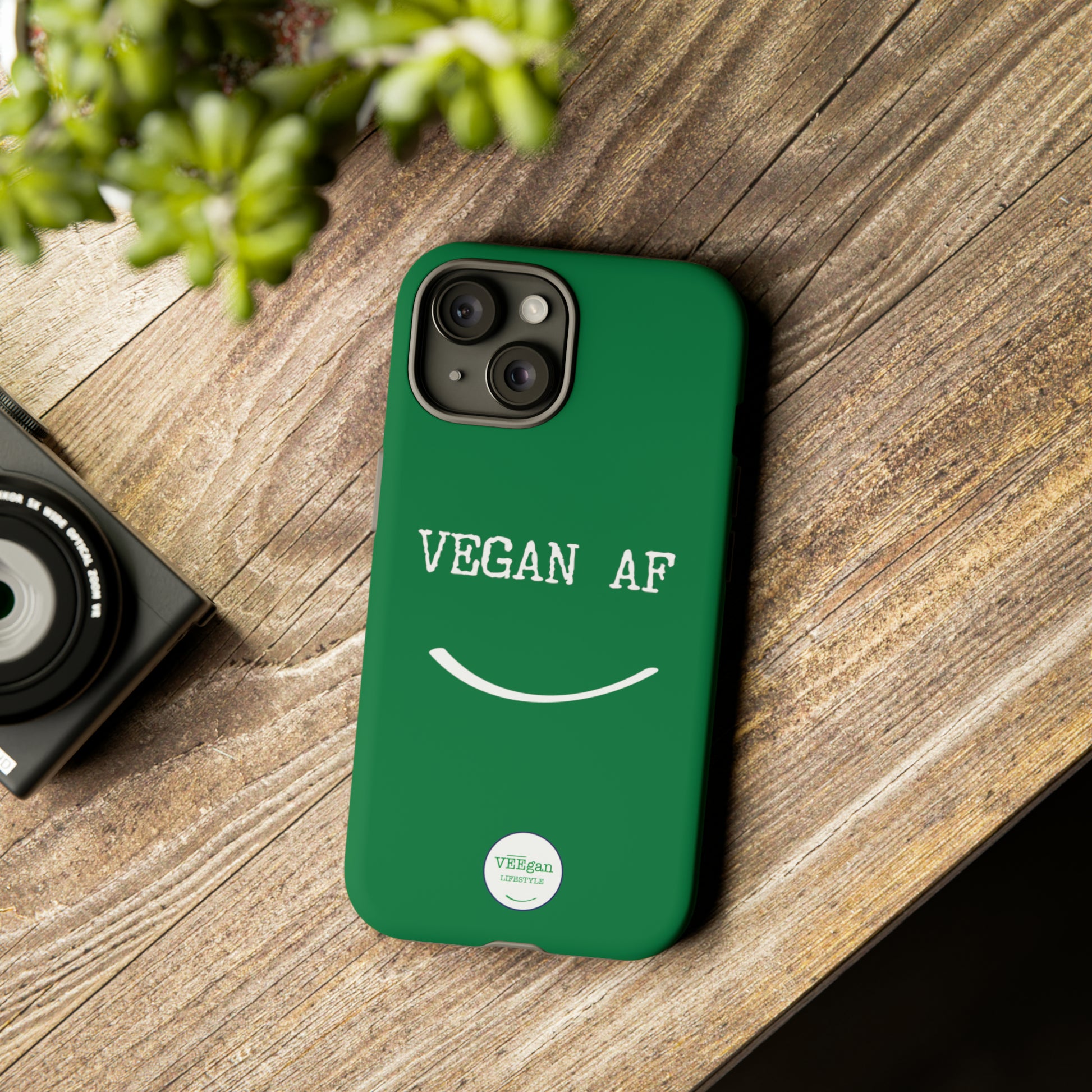 front view "Vegan AF" Tough green Phone Case with smile  lifestyle environment