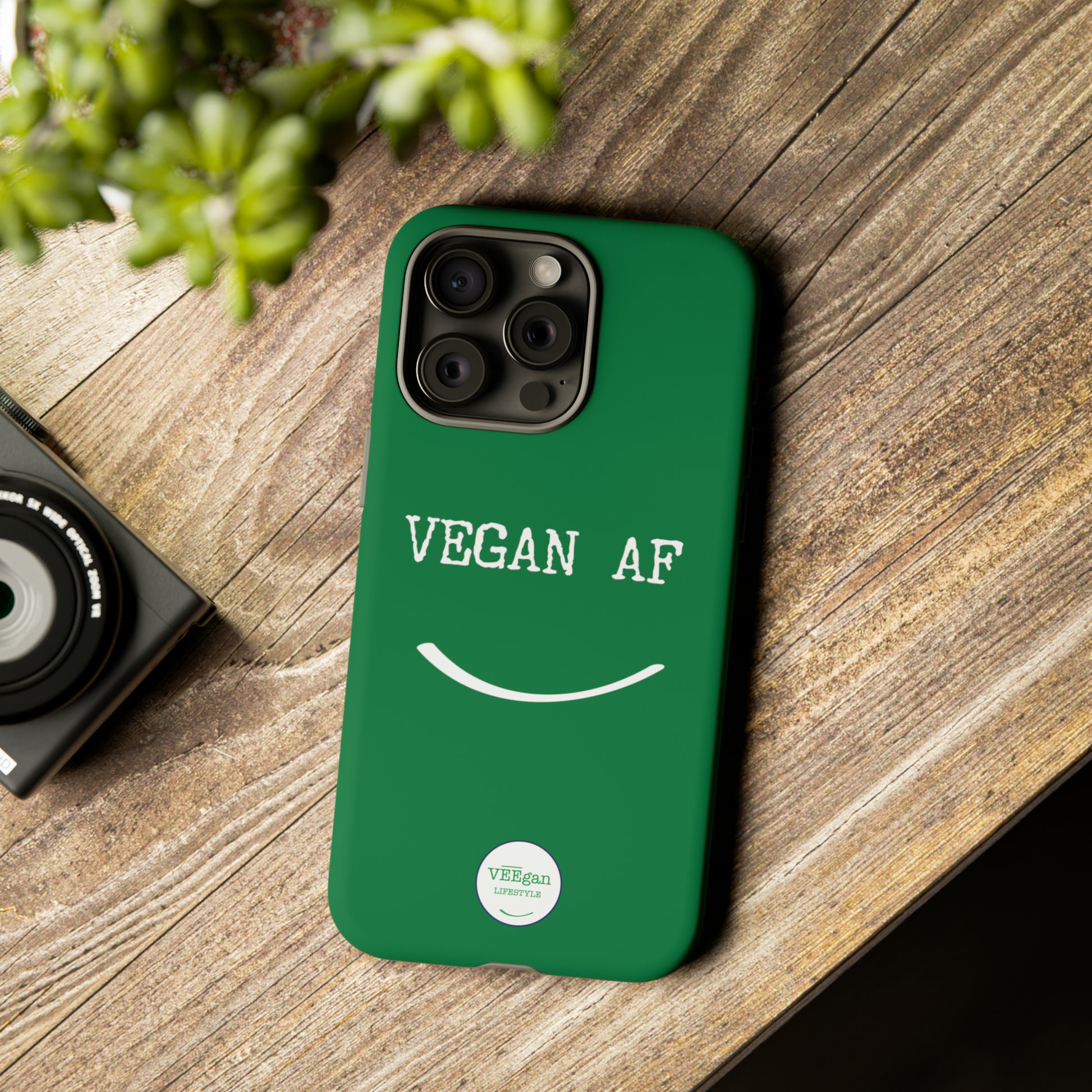 front view "Vegan AF" Tough green Phone Case with smile  lifestyle environment