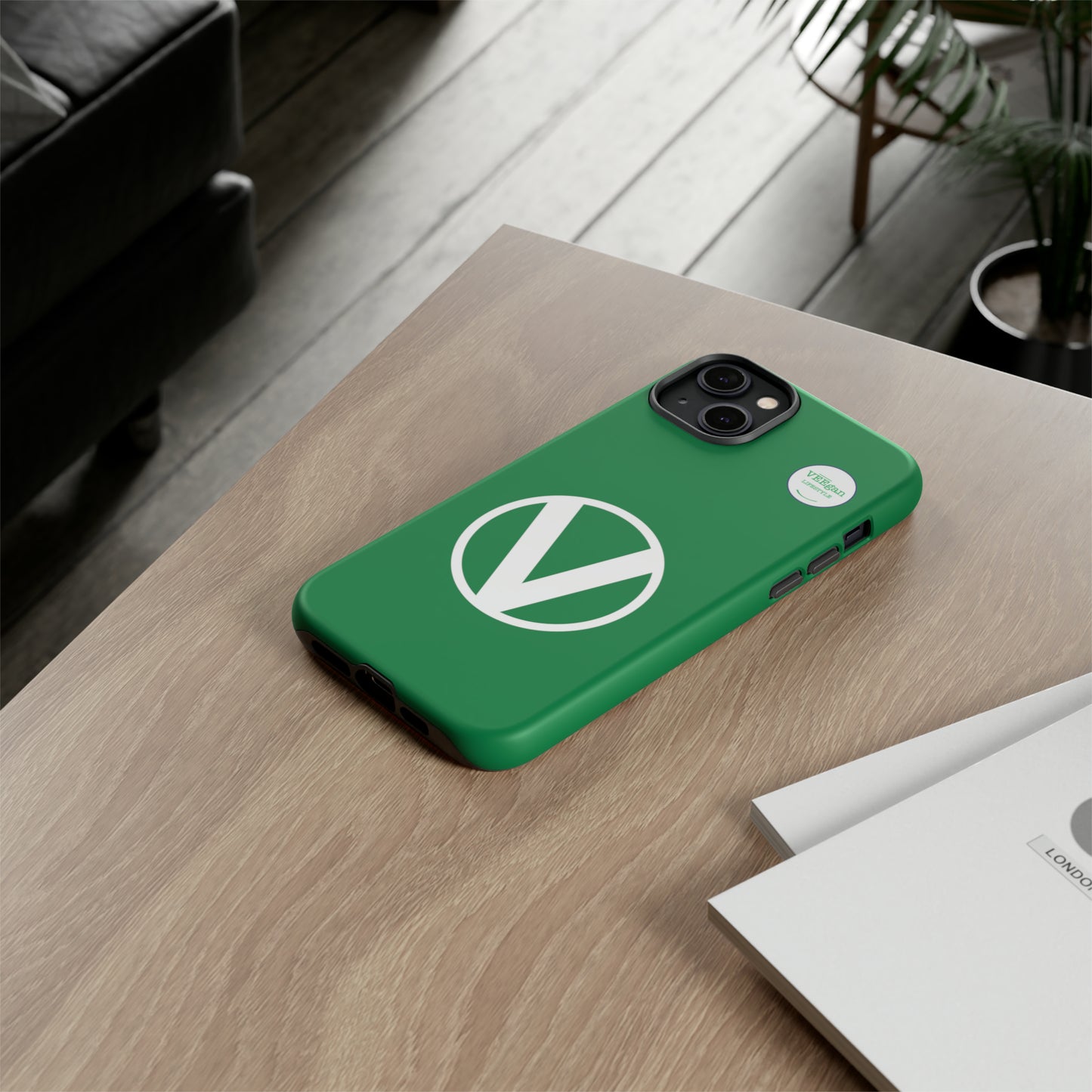 front view "Circle-V" green tough phone case on office desk