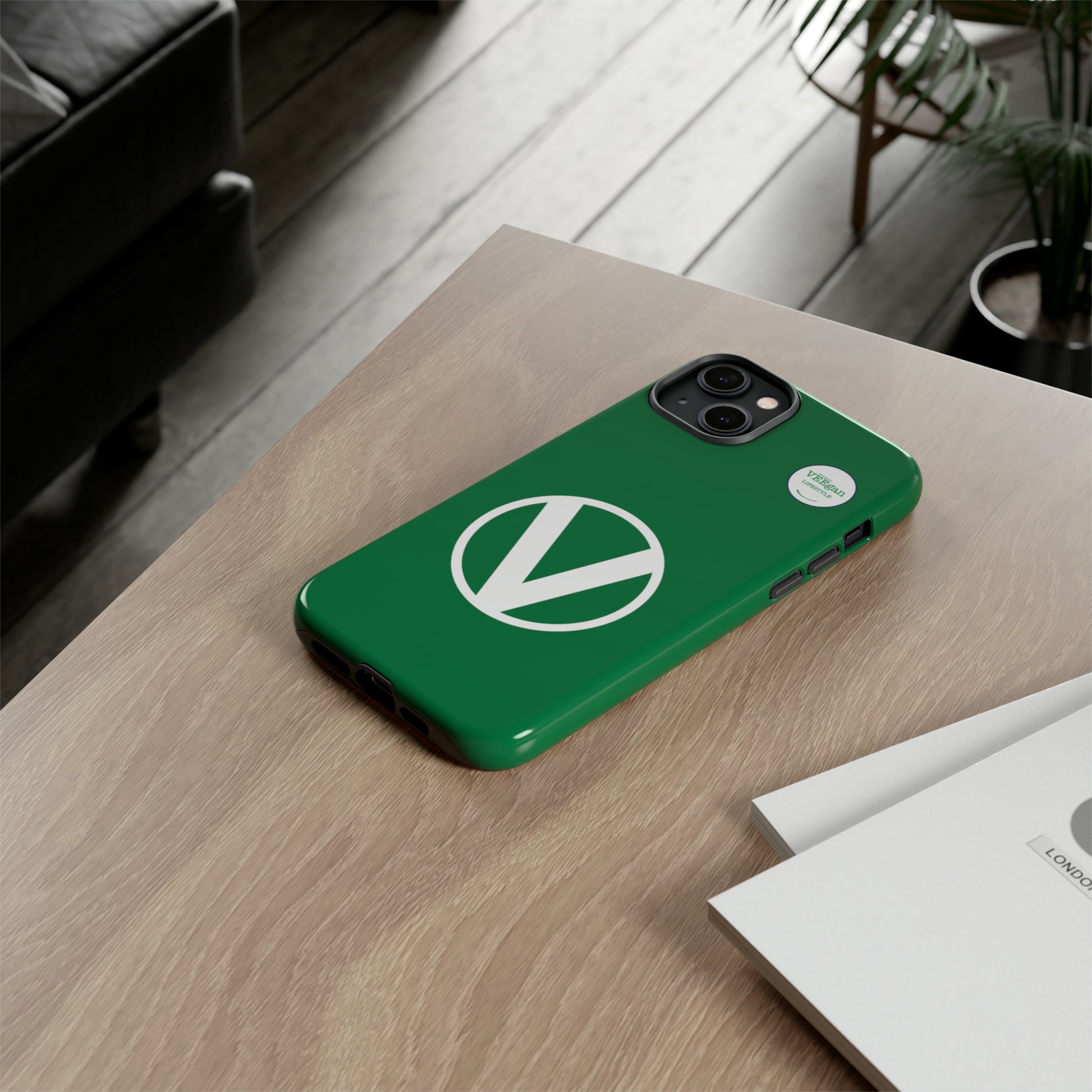 front view "Circle-V" green tough phone case on office desk