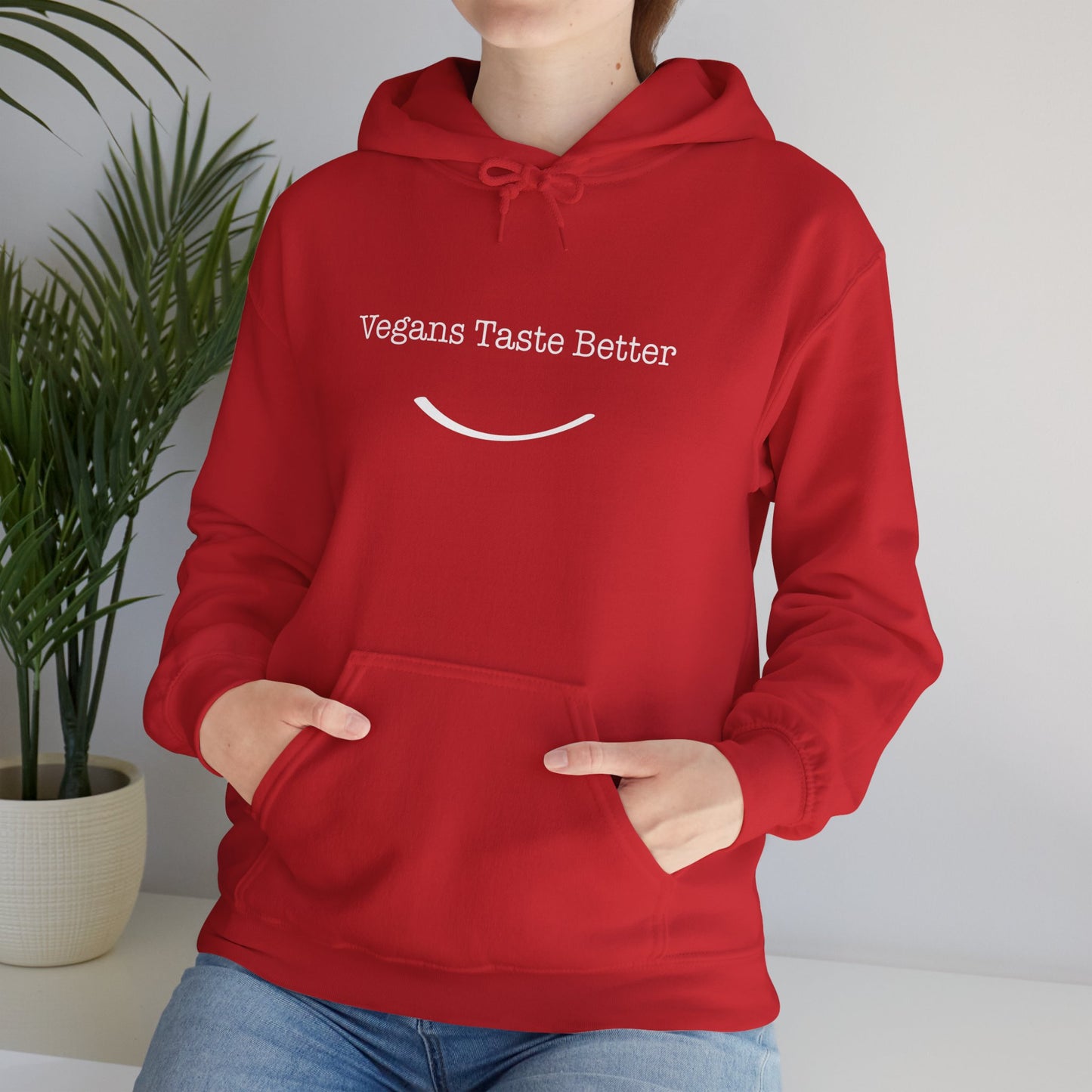 front view "Vegans Taste Better" red hoodie lifestyle female