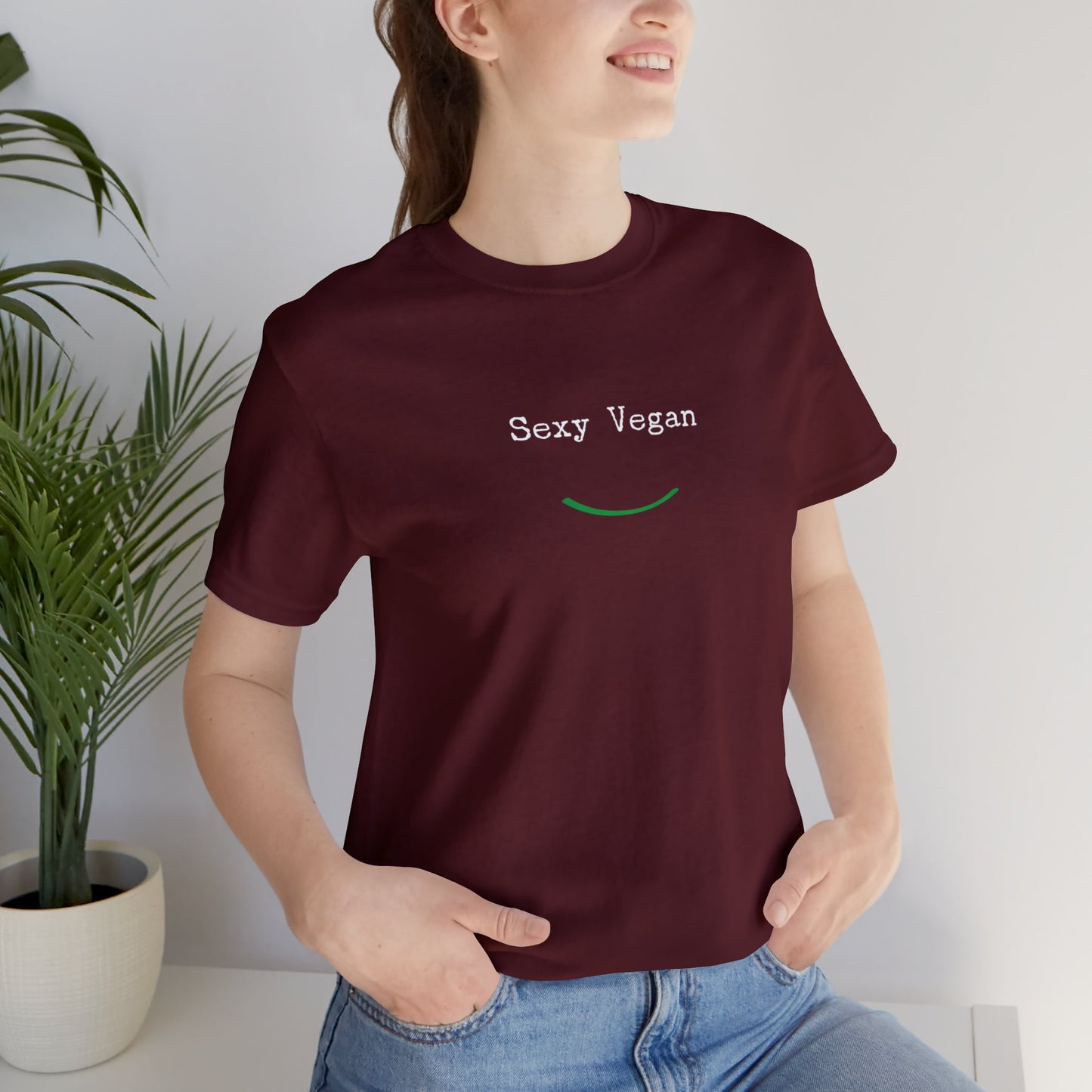 front "Sexy Vegan" cranberry t-shirt with smile female lifestyle