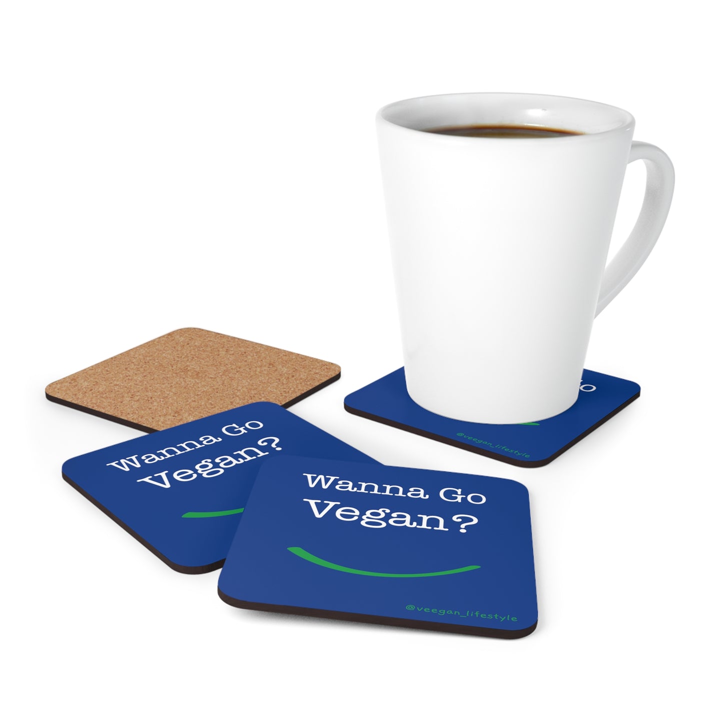 front view "Wanna Go Vegan?" blue cork square coaster set on white background