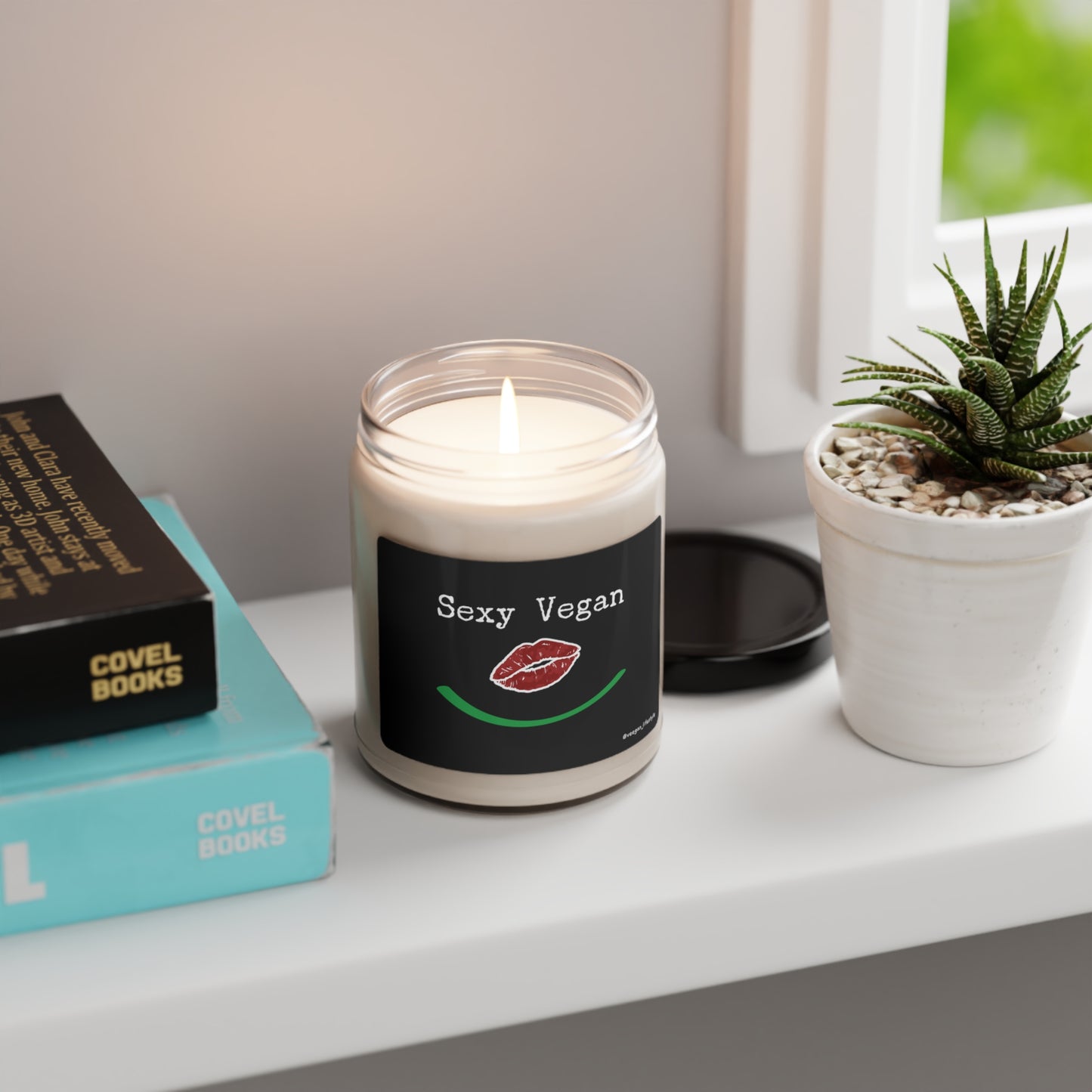 front "Sexy Vegan" scented candle with lips smile lifestyle environment