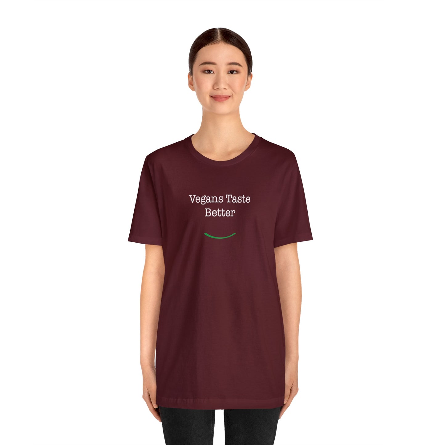 front view "Vegans Taste Better" cranberry unisex t-shirt on white female