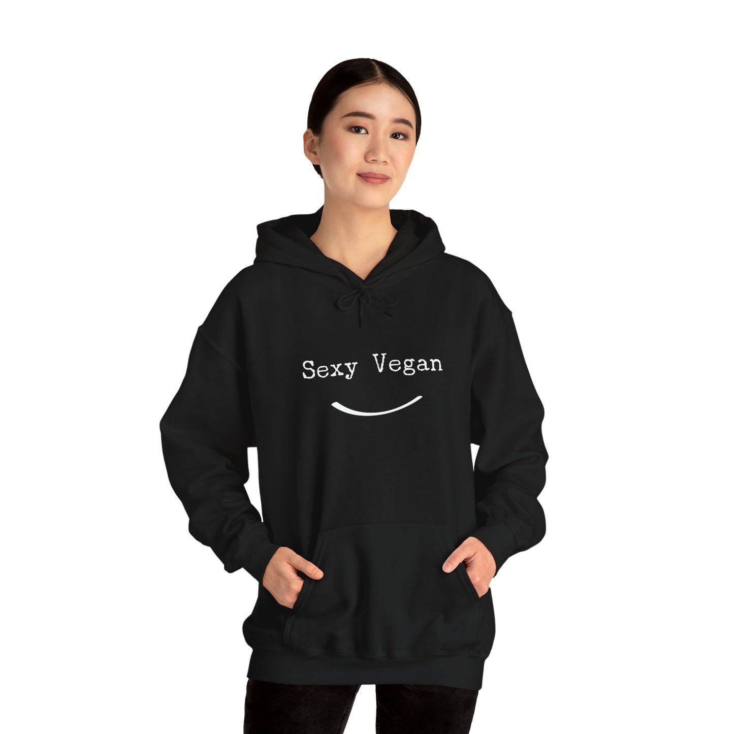 front "Sexy Vegan" black hoodie with smile on white female