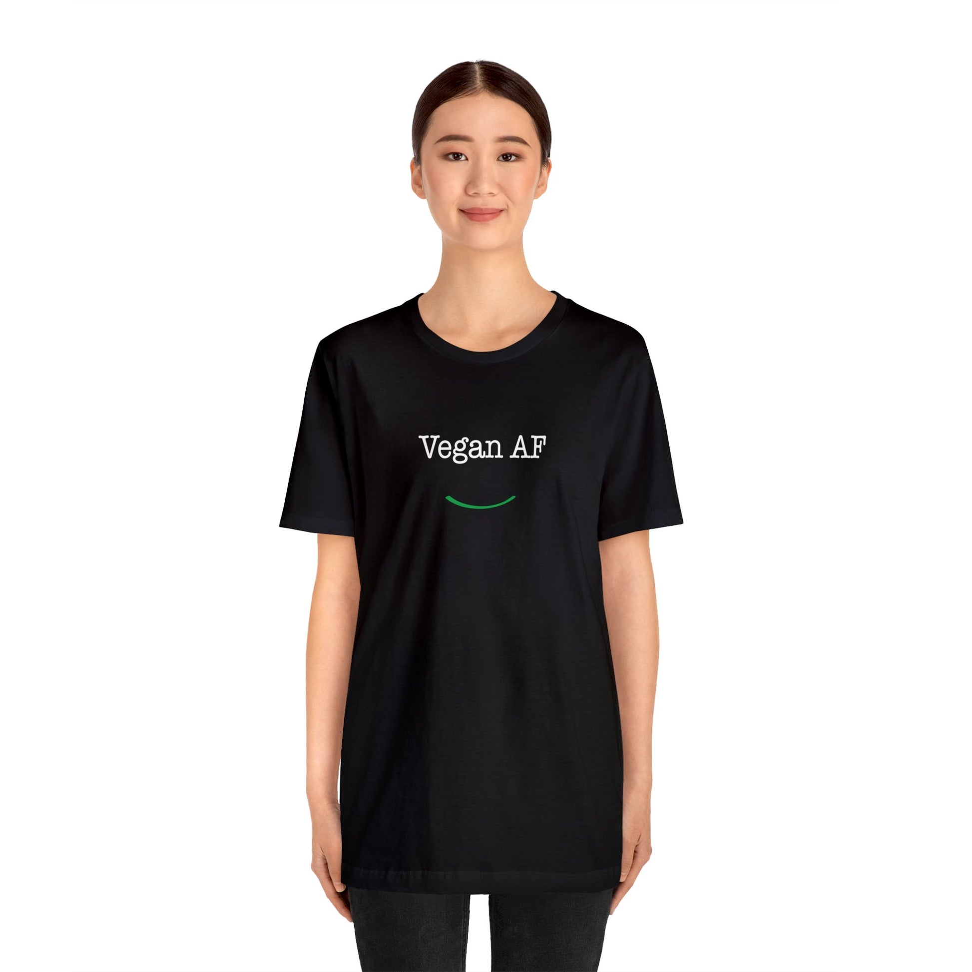 front view "Vegan AF" black t-shirt with smile white background female