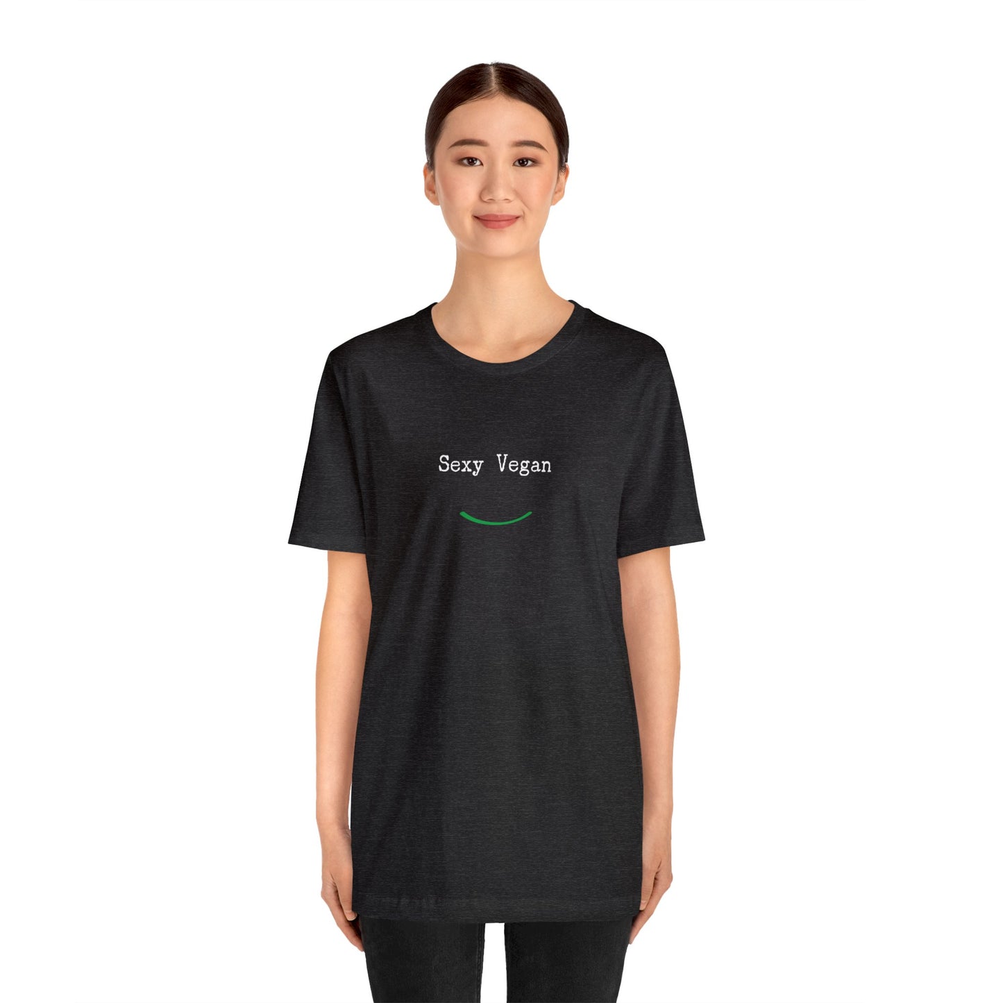 front "Sexy Vegan" black t-shirt with smile on white female