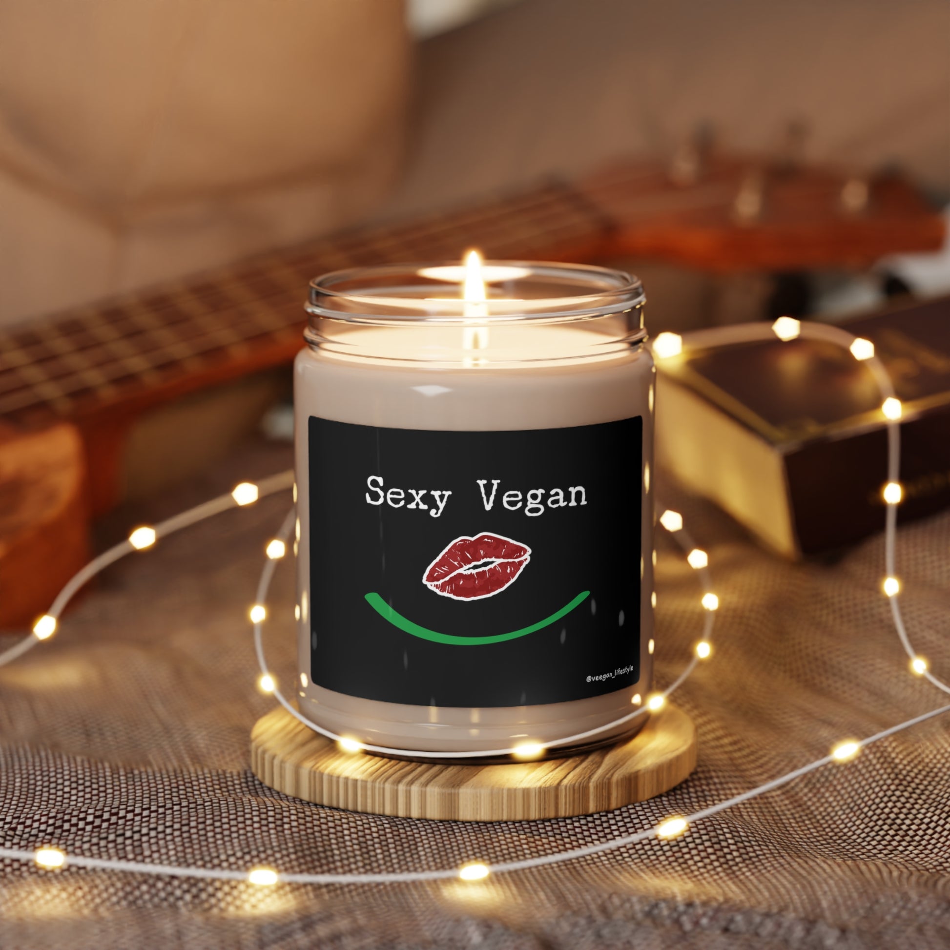 front "Sexy Vegan" scented candle with lips smile lifestyle environment