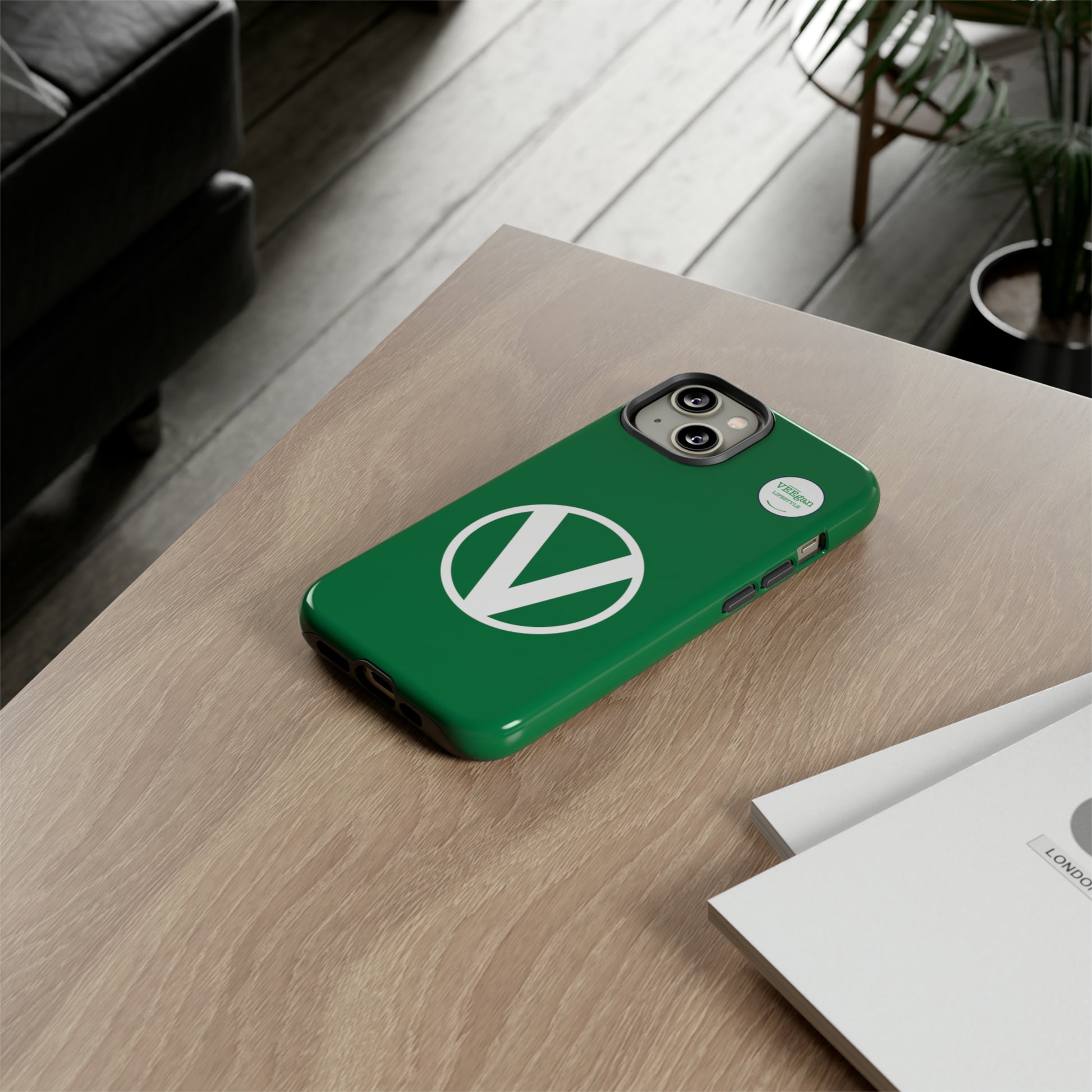 front view "Circle-V" green tough phone case on office desk