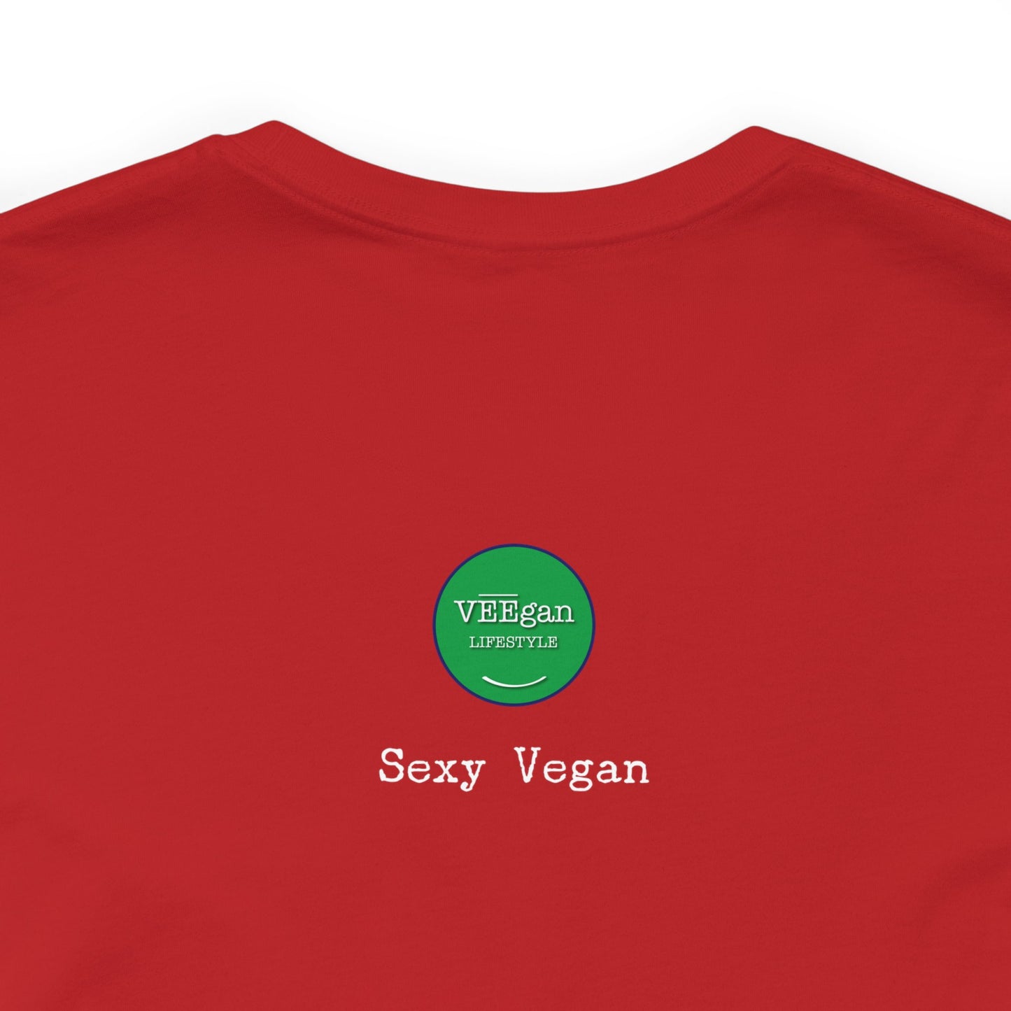 front "Sexy Vegan" green t-shirt with smile on white detail