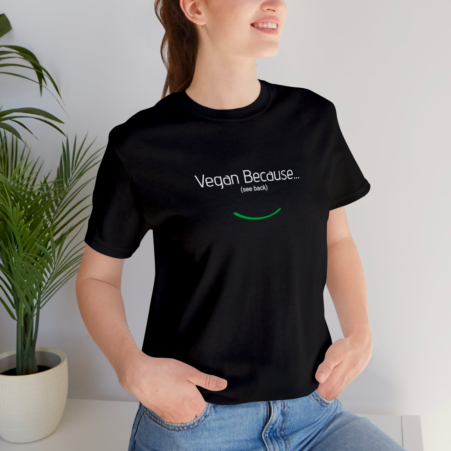 front view "Vegan Because 20,000 animals have been slaughtered since you began reading this" black t-shirt lifestyle environment female